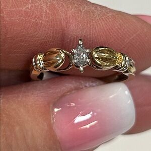 400066 10k solid yellow gold diamond ring.